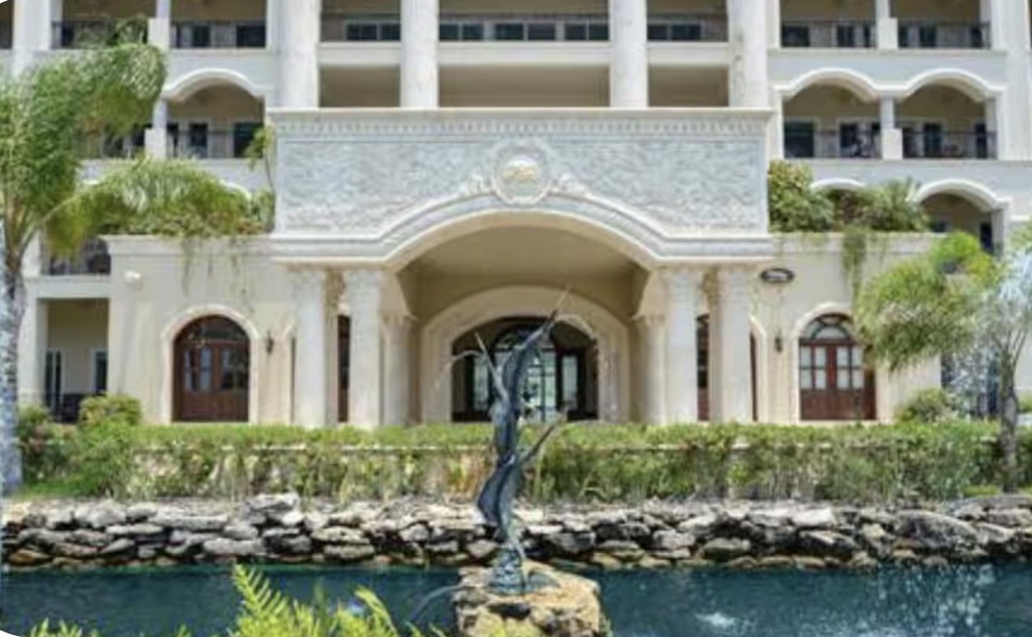 The Landmark grand entrance with fountain and sculpture