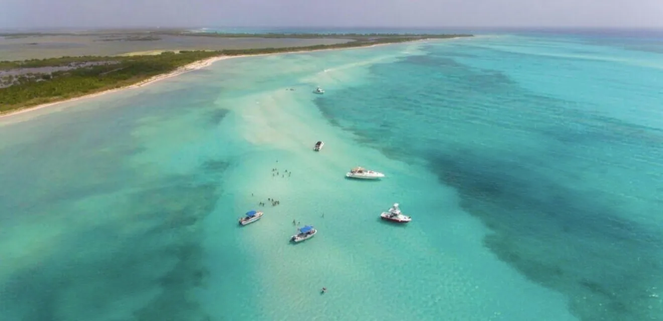 Aerial view of boats anchored at the El Cielo sandbar in turquoise water, Cozumel